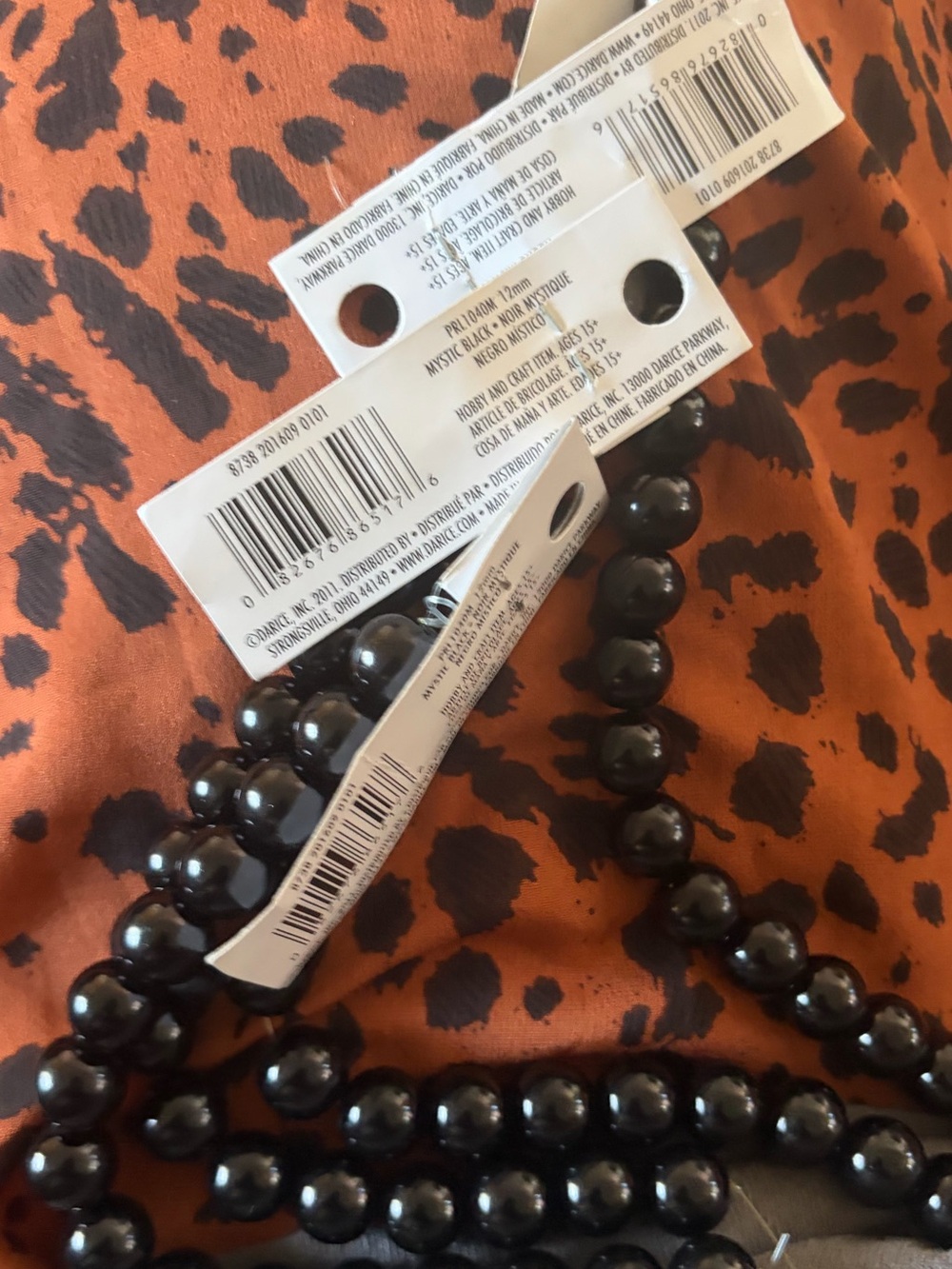 Darice glass pearls mystic black 12mm 4 strands